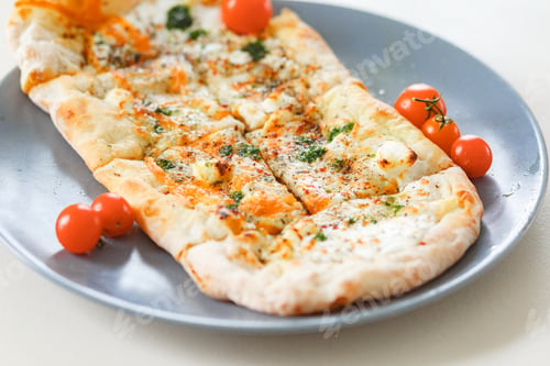 Preview: Close up of food Romanian pizza on plate on white table