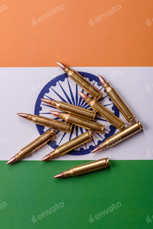 Preview: Money and flag of India with ammunition and tank as a concept of weapons for war. India and weapons