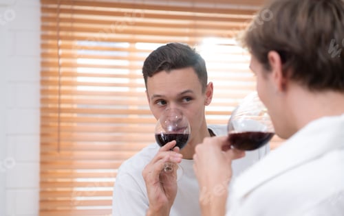 Preview: LGBT Young couple celebrate the day of love between each other with fine wine
