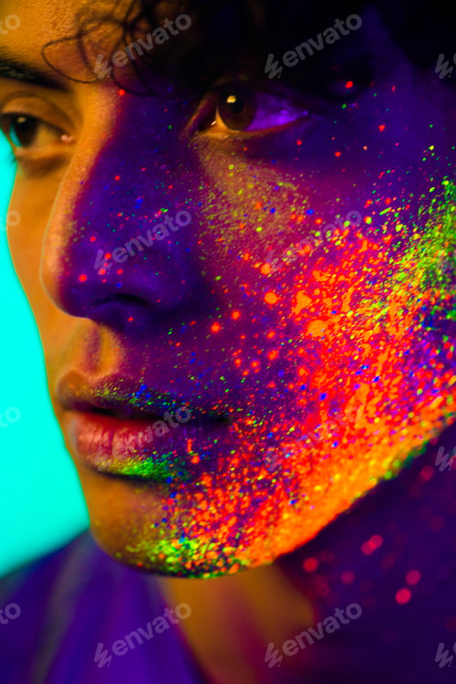 Preview: Fashion model with fluo painting on the face