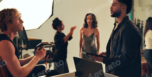 Preview: Photographer, team and model with people in studio for behind the scenes, planning and production.