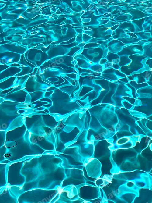Preview: A pattern of various shades of turquoise on the surface of a swimming pool. Water background.