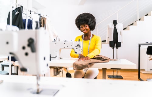 Preview: Female fashion designer at work