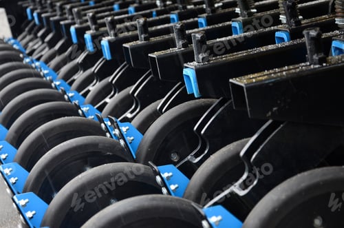 Preview: Row of wheels of the new industrial agricultural seeder close up