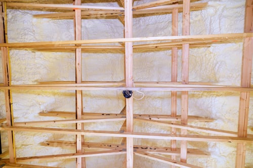 Preview: Under new frame houses, thermal foam insulation is installed under a roof