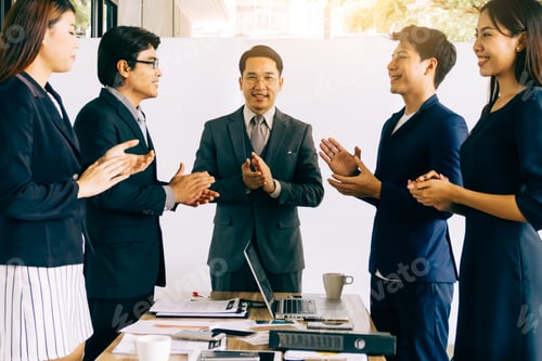 Preview: Business people clapping hands during a meeting, success and team work concept.