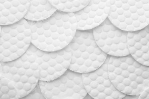 Preview: Many cotton pads as background, top view