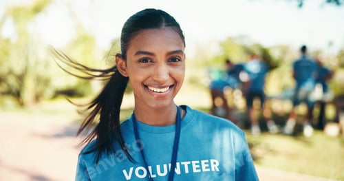 Preview: Charity, portrait and wind with woman volunteer outdoor in park for community food drive or donatio