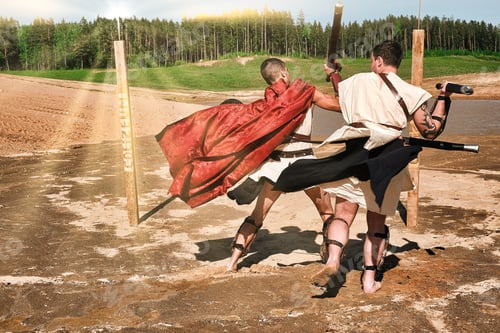 Preview: A Concept Photo Of A Roman Battle Of Two Warriors Of The Colosseum In Action With Aggressive