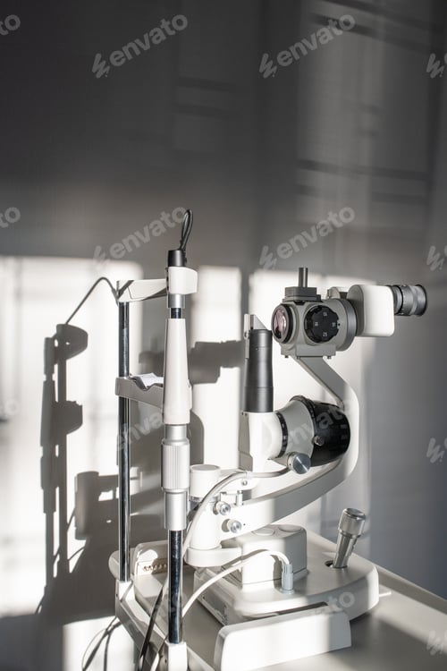 Preview: Ophthalmological diagnostic equipment on doctor workplace inside medical office