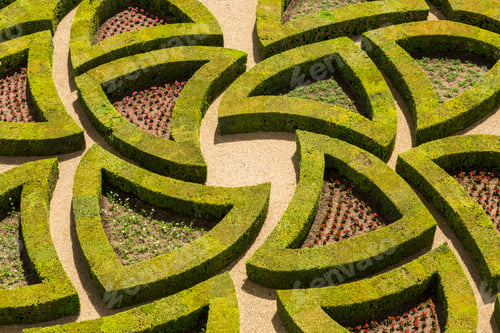 Preview: High angle view of parterre in the formal gardens of a baroque chateau.