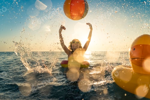 Preview: Happy child having fun on summer vacation