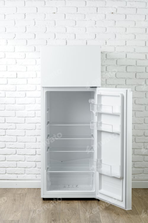 Preview: White Refrigerator Open Against Brick Wall