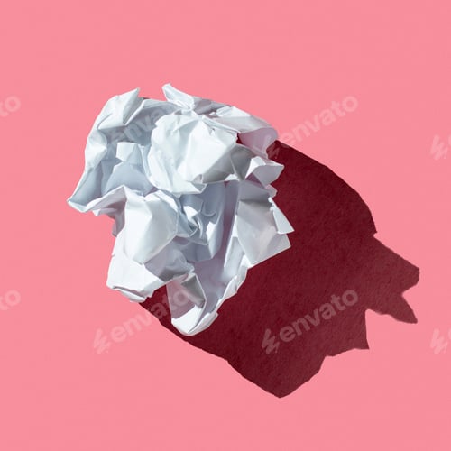 Preview: Crumpled white paper ball on a pink background with hard light