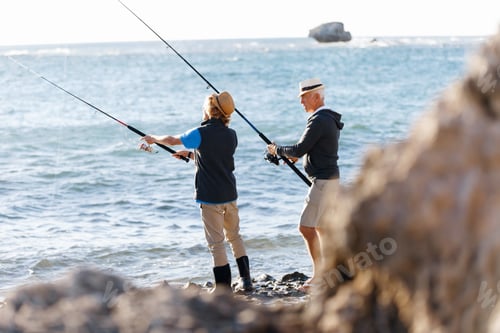 Preview: Men Fishing Together at the Beach on Sunny Day