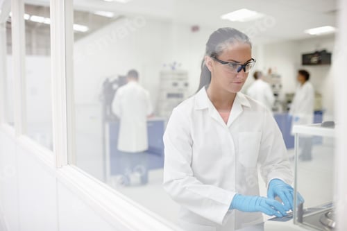 Preview: Scientists working in laboratory