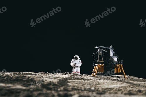 Preview: Astronaut miniature toy next to a spaceship on the moon