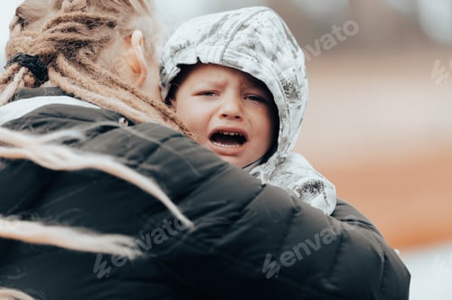 Preview: Mom soothes baby. The baby is crying. Mother holding crying baby.