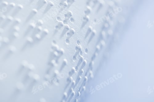 Preview: selective focus of braille text on white paper with copy space