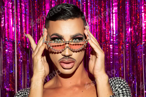 Preview: portrait of drag queen diva in glitter night