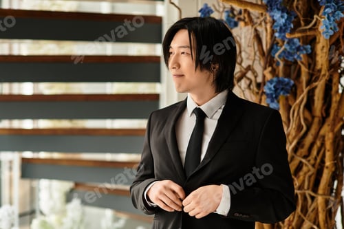 Preview: Charming groom in a stylish suit gets ready for his wedding at a beautiful venue
