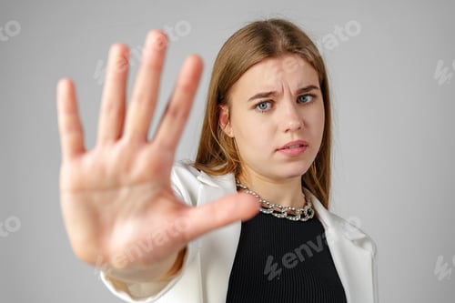 Preview: Young Woman Making Stop Sign With Hand