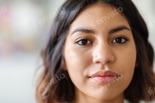 Preview: Closeup Shot Of Young Arab Female Face Looking At Camera