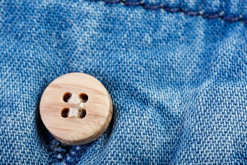 Preview: Denim Jeans Texture Background With Torn. The Texture Of The Colored Cotton Fabric. Stitched