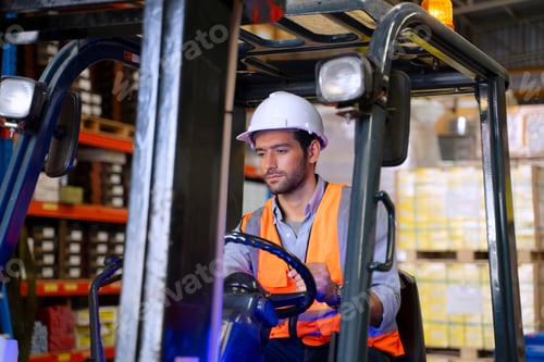 Preview: Blue collar worker is working at factory.