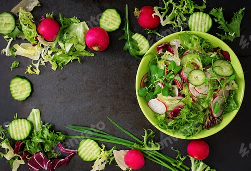Preview: Fresh salad of cucumbers, radishes and herbs. Top view