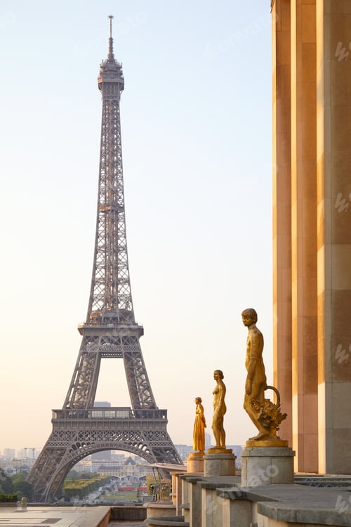 Preview: Eiffel tower and Trocadero golden statues, clear summer in Paris
