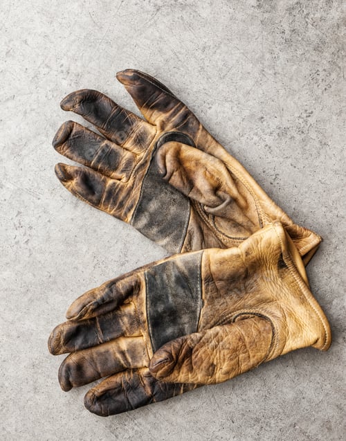 Preview: Close-up of a pair of used work gloves in a shop