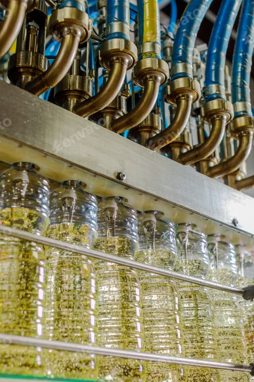 Preview: Sunflower Oil Bottling Line Close Up of Industrial Filling Machine in Modern Food Factory Automation