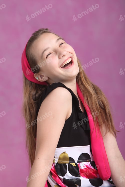Preview: Cheerful Girl in Colorful Dress on Pink Background