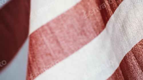 Preview: Close-up shot of the red and white stripes of the American flag