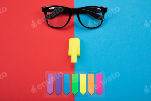 Preview: Glasses isolated on blue and red background