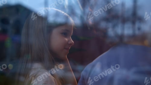 Preview: Boy and girl are talking in cafe. Stock footage. Cute couple of kids are sitting in cafe. Children