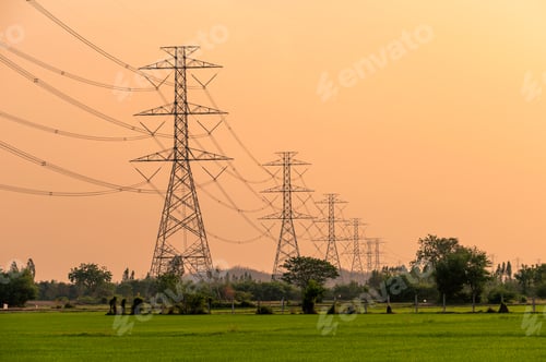 Preview: Arrangement of High voltage pole, Transmission tower on rice field at sunset