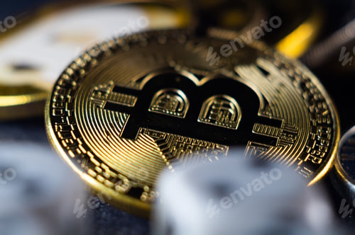 Preview: Coin with the Bitcoin on it on a blurred background