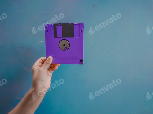 Preview: Hand holding floppy disk