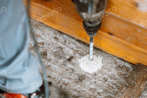 Preview: Drilling a hole in a concrete block with a hammer drill power tool