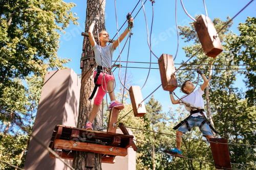 Preview: Brave kids climbs in rope park, playground