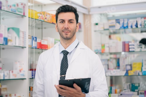 Preview: Portrait of male pharmacist with digital tablet