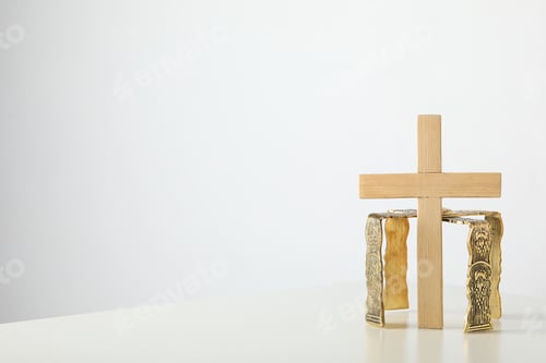 Preview: Wooden cross on white background, space for text