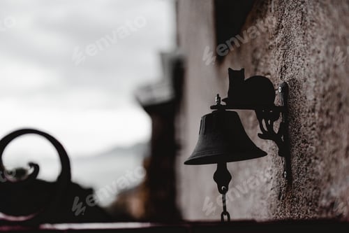 Preview: Vintage bell on wall of building