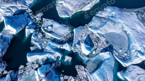 Preview: Aerial drone view of floating icebergs in Jokulsarlon glacier lagoon in Iceland, top view