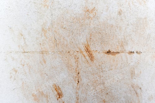 Preview: Dirty brick block wall with cat footprints scratches or paw print stains.