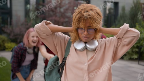 Preview: Group of angry students teenagers multiracial classmates mock humiliate bully mockery at college