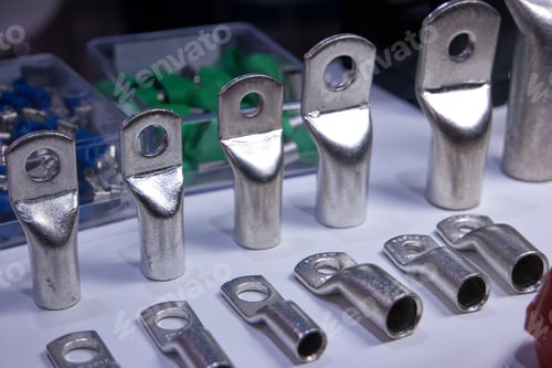 Preview: Steel machinery components with holes.
