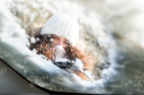 Preview: Car window in snow.